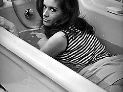 Neat gals have nice time posing in the bathtubs in their favorite vintage lingerie right on...