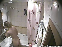 Lovely blondie caught taking a shower