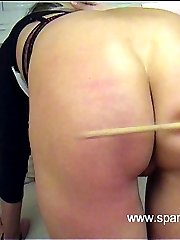 Leg spread caning for stunning blonde with full ripe ass - stinging strokes