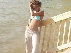 Ebony teen chick flaunts tight body