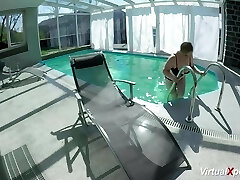 huge-chested Milf masturbating at the pool