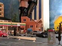 splendid giantess stomping city in high heels and boots