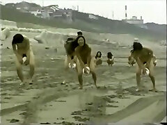 japanese nude femmes ball playnig on the beach