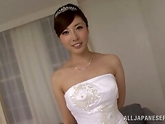 Japanese bride is pounded by two guys in a threesome