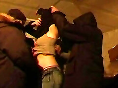 A group of hard peckers playing with a horny babe from France in the dungeon space