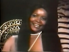 Mouth-watering and pretty vintage black girl with enormous breasts