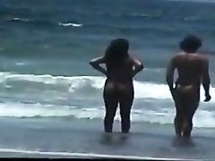 Bare couple at the beach