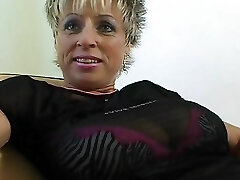 Older German chick with good-sized natural tits playing with her sex toy