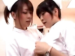 Young Nurse Pawing Her Pussy With Pen Her Colleauge Joins Her Smooching Rubbing Tits