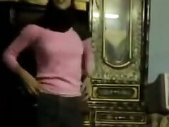 Pretty Arab nymph dances in front of a camera in homemade flick