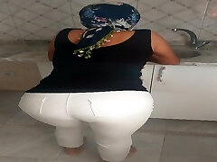 Turkish woman in white tights, lean stockings, hijab