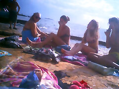 Upshorts jizz-shotgun flash for group of girls on beach