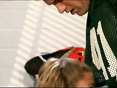 Blond teen cheerleader inhales jock&rsquo;s cock in locker room, then gets fucked