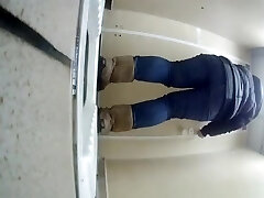 Teen in jeans caught peeing