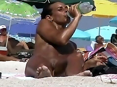 Nudist beach voyeur camera hunting for naked twats