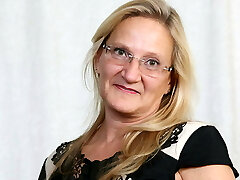 American milf Mary Wana unclothes off and plays at the office