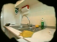 Hefty and ugly matured wife changes her clothes in kitchen on spy cam1