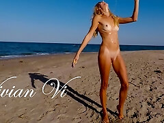 Naked Workout on the beach - a beautiful bony milf with small breasts