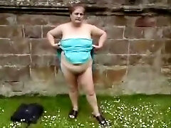 Fat granny showing her naked body