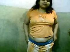 Indian amateur BBW dame in the bathroom stripping on cam
