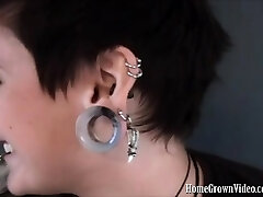 Heavily pierced and tatted brunette Isabell is chatting