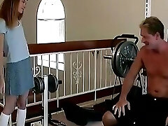 Skinny Barely Legal Slut Sucks a Hard Cock on a Weight Bench Then Gets Drilled