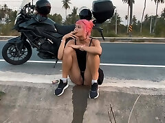 Motorbike girlfriend pissing on the roadside