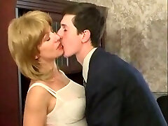 Beautiful mature woman is ready to pummel for the office job
