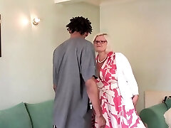 Blonde mature Bbw sucking and fucking a big black dick