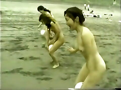 japanese naked girls ball playnig on the beach