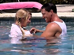 Sexy blonde tourist doll Brynn Tyler blows cock in the pool