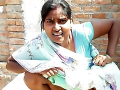 Mind-blowing Indian bhabhi pissing on her house roof and fingering her cremei tight pussy