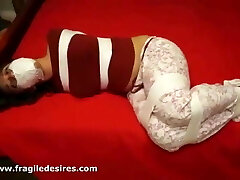 Fragiledesires White Gauze Gagged and Hands Taped in Bondage