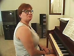 Plump piano teacher squirted getting skewered with two cocks