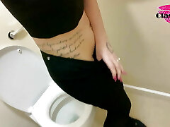 Fashionable recording Herself piss in public toilets