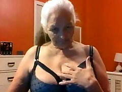 Grandmother 68 years shows big tits and pussy
