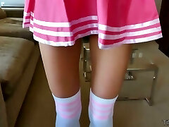 Slim smallish cheerleader Paisley Rae guzzles a thick hard penis and gets her muff stretched
