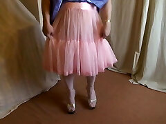 Lilac bridesmaid dress, pink petticoat and platform high-heeled shoes