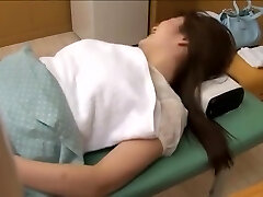 Busty Jap teen screwed in voyeur erotic massage vid