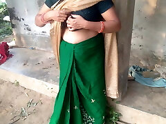 Desi Indian MILF with a huge booty milks her own boobs in a farmhouse