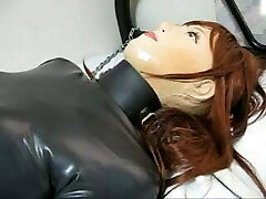 Woman rubber mask in breathplay