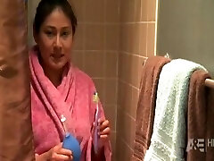 .Why not to spy on inborn brunette wife taking a shower and showcasing body