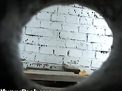 Slender white young chick in black underpants filmed in the toilet guest room