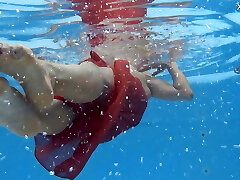 Hottest milf unclothes underwater