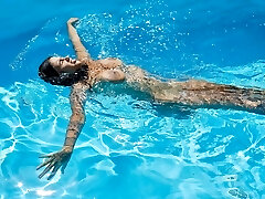 Big tits Latina babe Yorgelis pleasure swimming