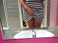 Horny teen in public toilet – so wild she opens her pussy 