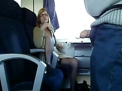 Mature wife sucks in train