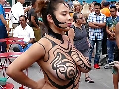 Big tits gal public body painting