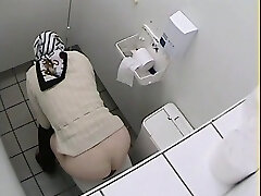 Grandmother got her ass on toilet voyeur video while pissing