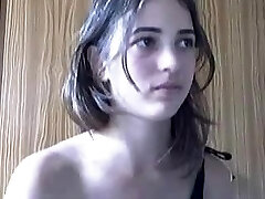 Young coquette with smallish tits danced in front of the webcam